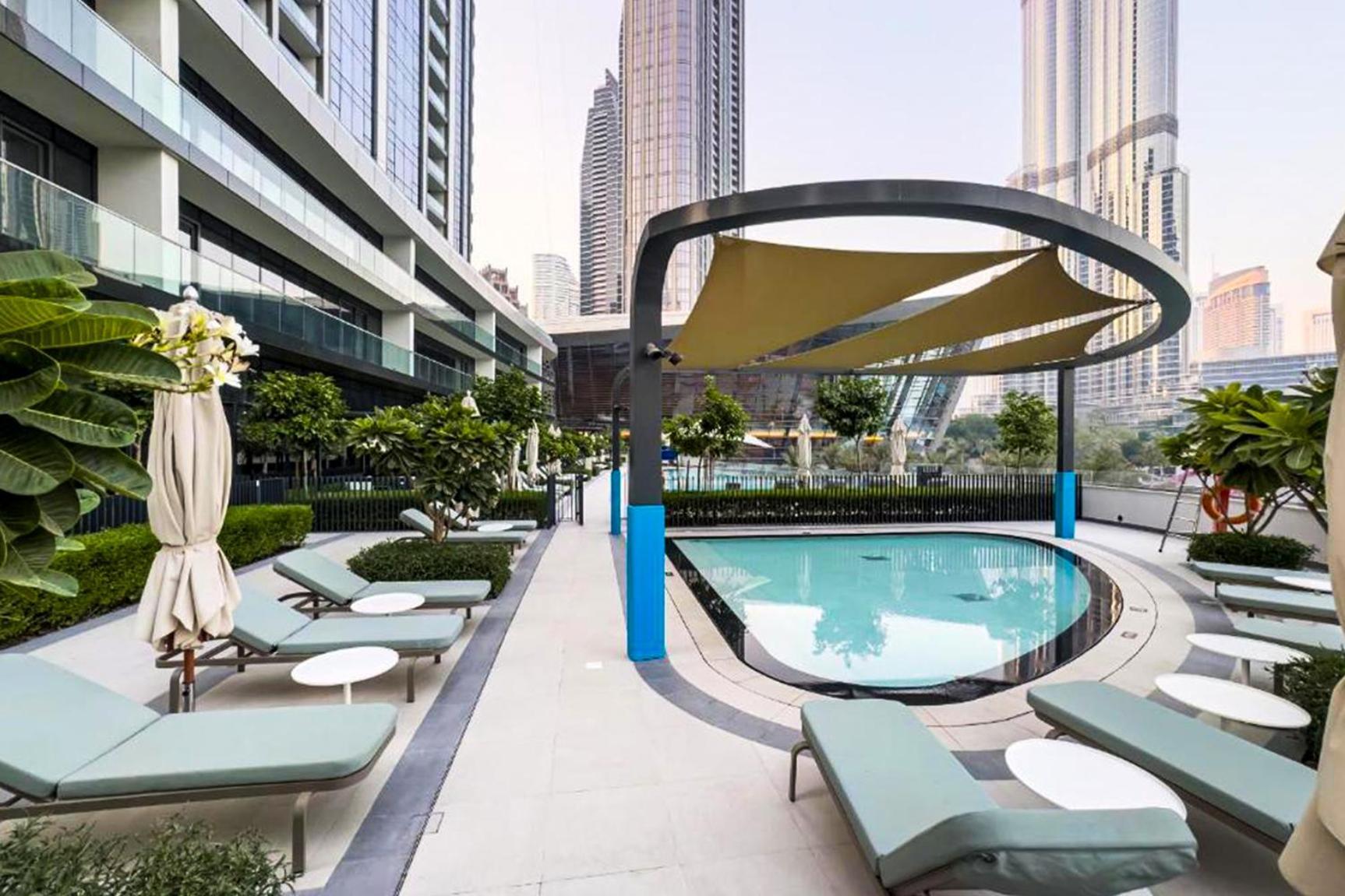 Livbnb-prestige 1br In Grande, Pool With Iconic Burj Khalifa View Dubai